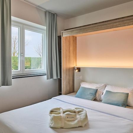 Holiday Suites นิวว์ปอร์ท ภายนอก รูปภาพ