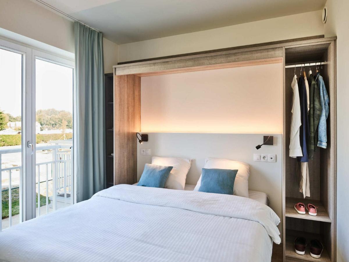 Holiday Suites นิวว์ปอร์ท ห้อง รูปภาพ